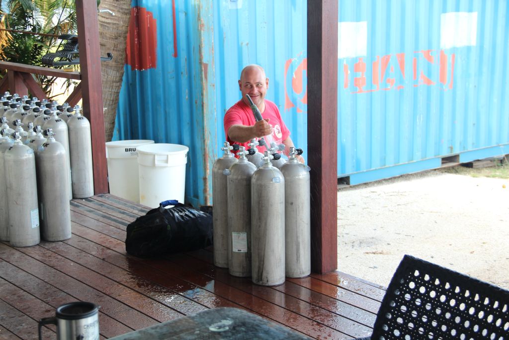 Diving instructor and air tanks