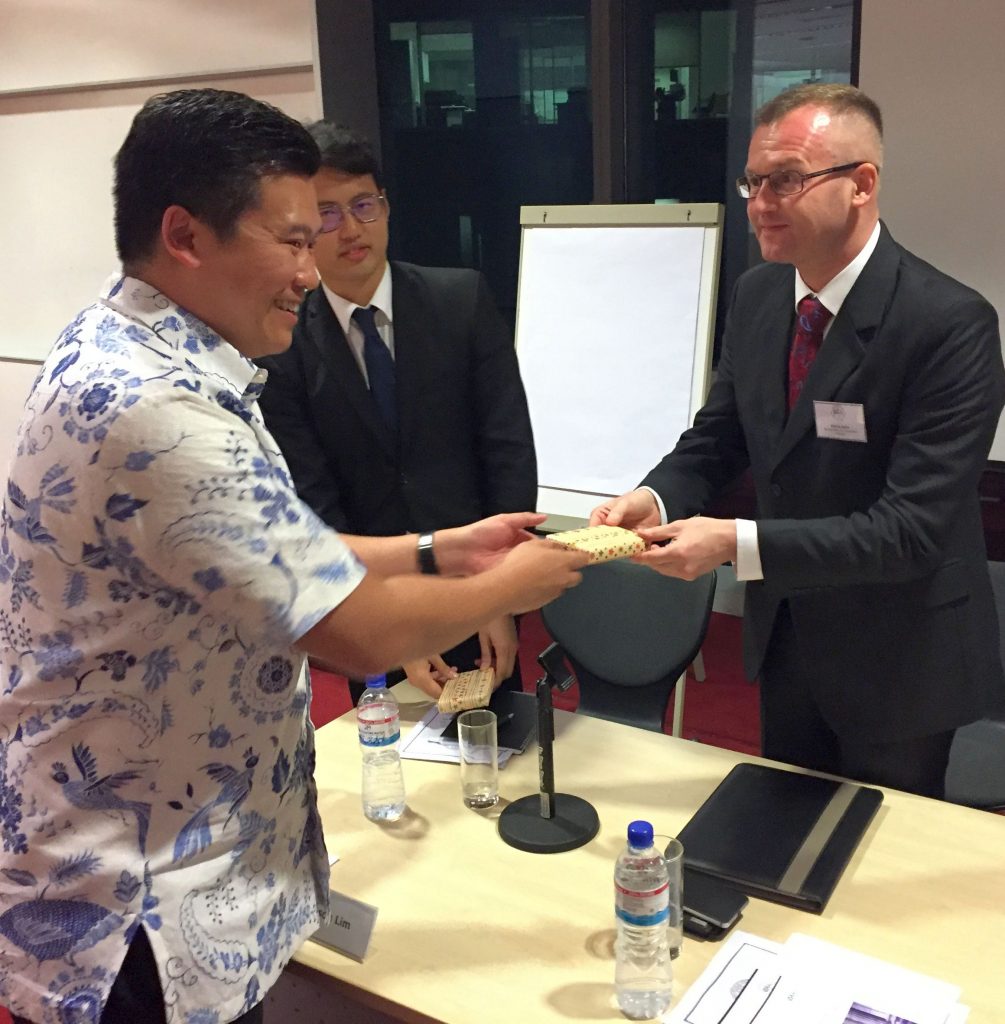 Patrick Dahm receiving a token of appreciation